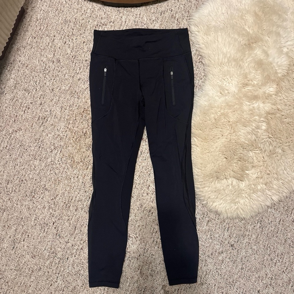 Lululemon pant. Size 8. Black leggings with mess seam, with pockets